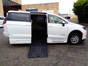 White Chrysler Voyager with BraunAbility Side Entry Automatic Fold Out conversion