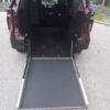 Red Toyota Sienna with Driverge Rear Entry Manual Fold Out conversion