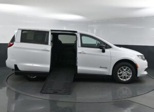 White Chrysler Voyager with BraunAbility Side Entry Manual Fold Out conversion