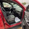 Red Chevrolet Traverse with BraunAbility Side Entry Automatic In Floor conversion