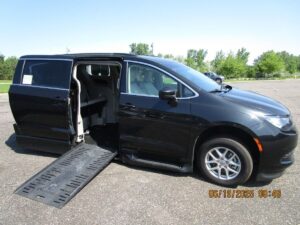 Black Chrysler Voyager with BraunAbility Side Entry Automatic Fold Out conversion
