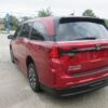 Red Honda Odyssey with BraunAbility Side Entry Automatic In Floor conversion
