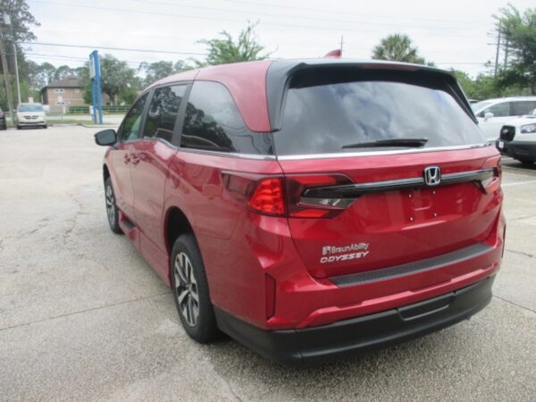 Red Honda Odyssey with BraunAbility Side Entry Automatic In Floor conversion