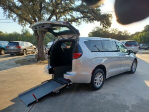 Silver Chrysler Pacifica with Driverge Rear Entry Manual Fold Out conversion