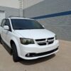 White Dodge Grand Caravan with Vantage Mobility Side Entry Automatic Fold Out conversion