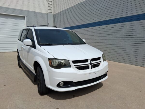 White Dodge Grand Caravan with Vantage Mobility Side Entry Automatic Fold Out conversion