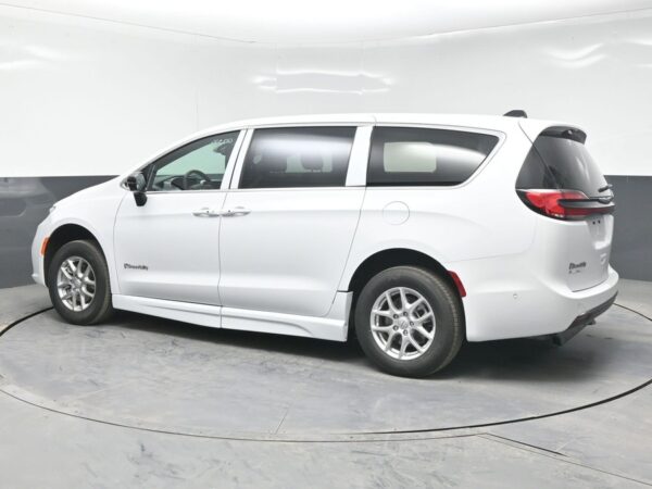 White Chrysler Pacifica with BraunAbility Side Entry Automatic Fold Out conversion