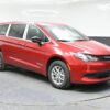 Red Chrysler Voyager with BraunAbility Rear Entry Manual Fold Out conversion
