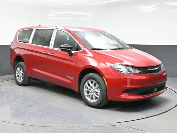 Red Chrysler Voyager with BraunAbility Rear Entry Manual Fold Out conversion