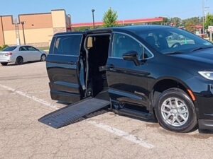 Black Chrysler Pacifica with BraunAbility Side Entry Automatic Fold Out conversion