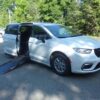 White Chrysler Pacifica with Driverge Side Entry Automatic Fold Out conversion