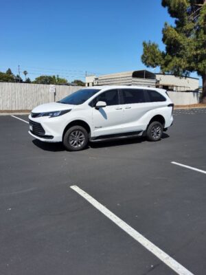 White Toyota Sienna with BraunAbility Rear Entry Manual Fold Out conversion