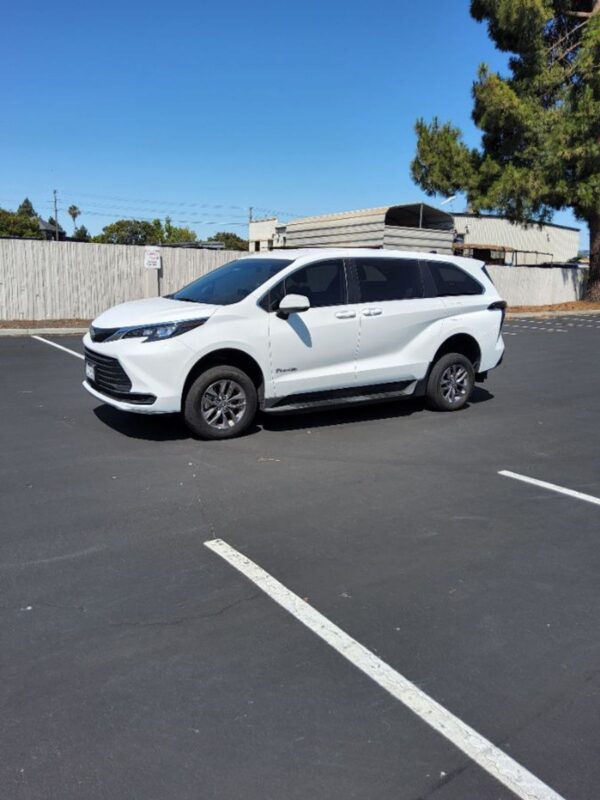 White Toyota Sienna with BraunAbility Rear Entry Manual Fold Out conversion