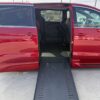 Red Chrysler Pacifica with BraunAbility Side Entry Automatic In Floor conversion