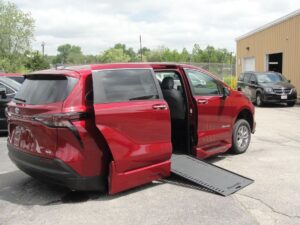 Red Toyota Sienna with BraunAbility Side Entry Automatic In Floor conversion