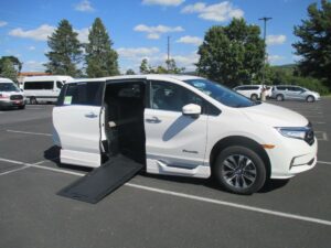 White Honda Odyssey with BraunAbility Side Entry Automatic In Floor conversion