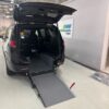 Black Chrysler Pacifica with Driverge Rear Entry Manual Fold Out conversion