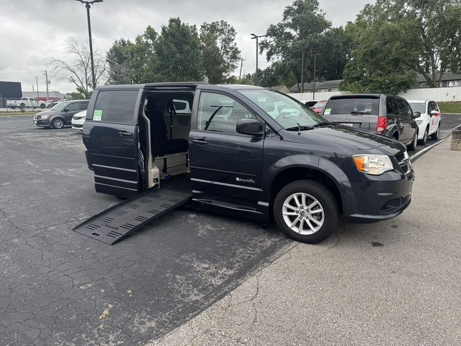Blue Dodge Grand Caravan with BraunAbility Side Entry Automatic Fold Out conversion