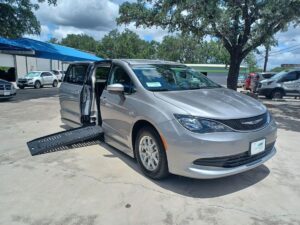 Silver Chrysler Pacifica with BraunAbility Side Entry Automatic Fold Out conversion