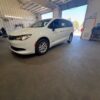 White Chrysler Voyager with Driverge Side Entry Automatic Fold Out conversion