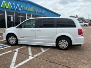 White Dodge Grand Caravan with BraunAbility Side Entry Manual Fold Out conversion