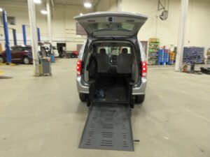 Silver Dodge Grand Caravan with BraunAbility Rear Entry Manual Fold Out conversion