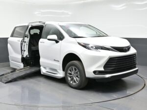 White Toyota Sienna with BraunAbility Side Entry Automatic Fold Out conversion