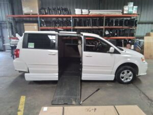 White Dodge Grand Caravan with Vantage Mobility Side Entry Automatic In Floor conversion