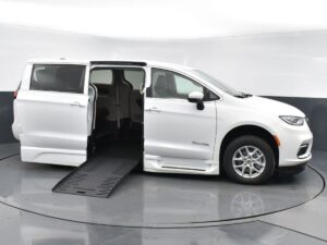 White Chrysler Pacifica with BraunAbility Side Entry Automatic Fold Out conversion