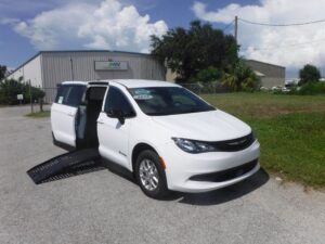 White Chrysler Voyager with BraunAbility Side Entry Manual Fold Out conversion