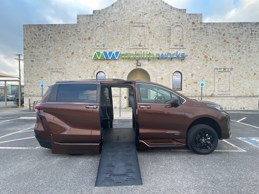 Orange Toyota Sienna with BraunAbility Side Entry Automatic Fold Out conversion