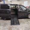 Black Dodge Grand Caravan with BraunAbility Side Entry Automatic Fold Out conversion