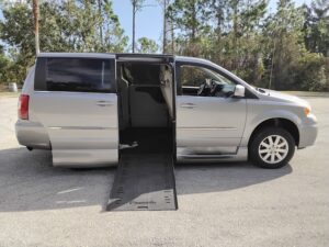 Silver Chrysler Town and Country with BraunAbility Side Entry Automatic In Floor conversion