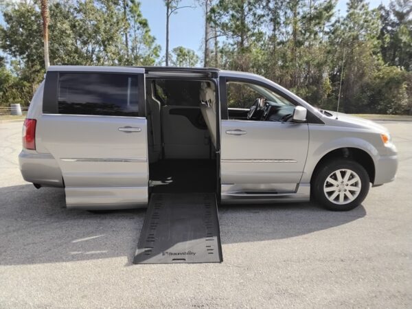 Silver Chrysler Town and Country with BraunAbility Side Entry Automatic In Floor conversion