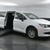 White Chrysler Voyager with BraunAbility Side Entry Manual Fold Out conversion