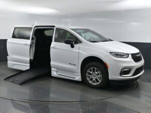 White Chrysler Pacifica with BraunAbility Side Entry Automatic Fold Out conversion