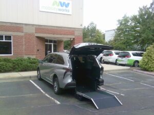 Silver Toyota Sienna with Driverge Rear Entry Manual Fold Out conversion