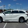 White Toyota Sienna with BraunAbility Side Entry Automatic Fold Out conversion