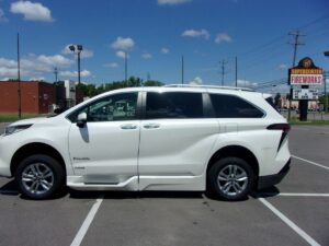 White Toyota Sienna with BraunAbility Side Entry Automatic Fold Out conversion