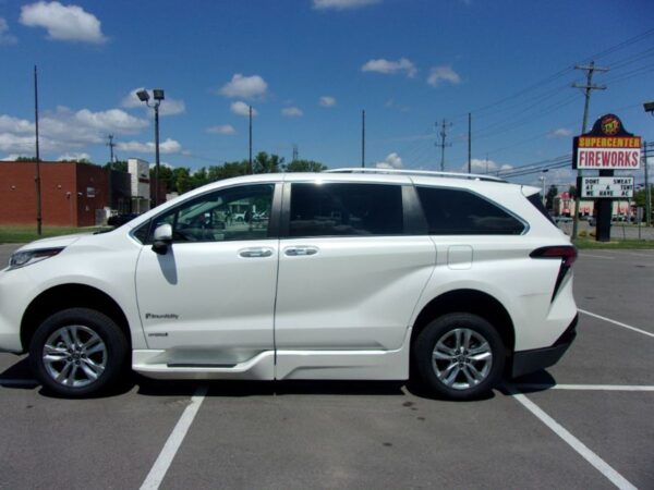 White Toyota Sienna with BraunAbility Side Entry Automatic Fold Out conversion