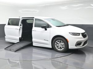 White Chrysler Pacifica with BraunAbility Side Entry Automatic Fold Out conversion