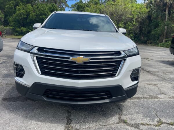 White Chevrolet Traverse with BraunAbility Side Entry Automatic In Floor conversion
