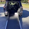 Blue Toyota Sienna with Driverge Rear Entry Manual Fold Out conversion
