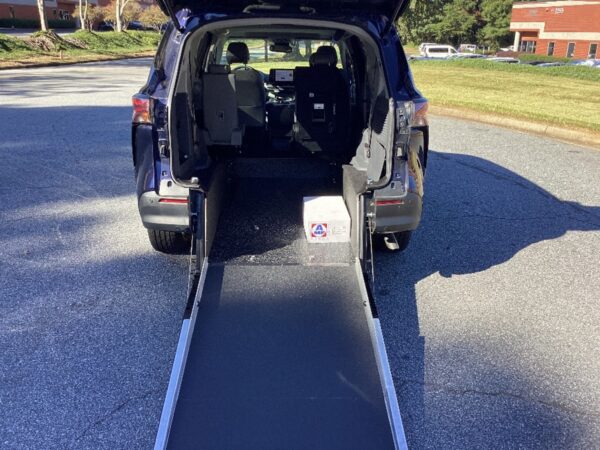 Blue Toyota Sienna with Driverge Rear Entry Manual Fold Out conversion