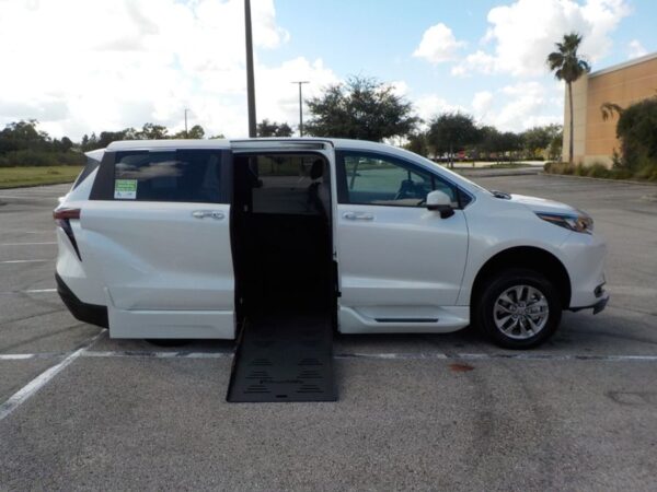 White Toyota Sienna with BraunAbility Side Entry Automatic Fold Out conversion