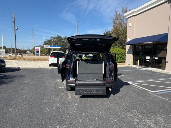 Blue Toyota Sienna with Driverge Rear Entry Manual Fold Out conversion