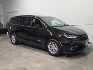 Black Chrysler Pacifica with Driverge Rear Entry Manual Fold Out conversion