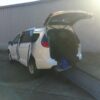 White Chrysler Pacifica with BraunAbility Rear Entry Manual Fold Out conversion