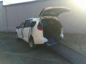 White Chrysler Pacifica with BraunAbility Rear Entry Manual Fold Out conversion