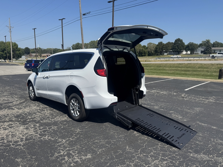 White Chrysler Voyager with BraunAbility Rear Entry Manual Fold Out conversion